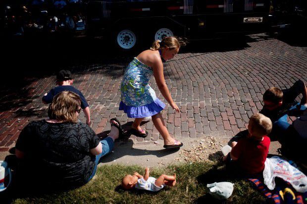 Doll and candy at Seward Grand Parade, 2012